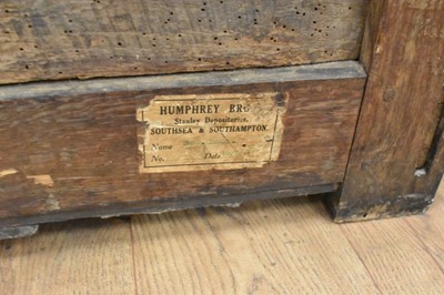 Lot 1466 - 17th century Continental oak cassone, of small size, with hinged lid and interior candle box, panelled front flanked by iron carrying handles, on stiles