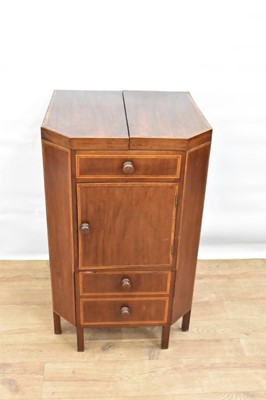 Lot 1486 - Unusual George III mahogany and tulipwood crossbanded wash stand, of canted square form, with fold over top enclosing fitted interior of apertures with rising mirror to rear, concealed drawer below...