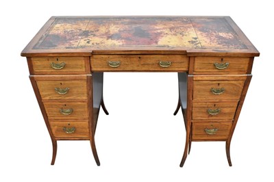Lot 1493 - Unusual Edwardian rosewood inverted breakfront pedestal desk by Frank Giles & Co. of Kensington, the leather inset top with three frieze drawers, makers mark stamped to drawer, raised on tapered p...