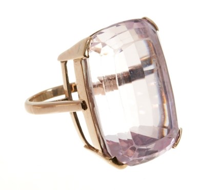Lot 565 - Kunzite cocktail ring with a large rectangular cushion shape kunzite in gold setting