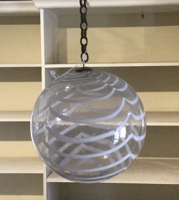 Lot 1460 - Antique glass witch ball, with white trailed ornament, approximately 20cm diameter