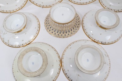 Lot 134 - A Sèvres gilt armorial dessert service, comprising four plates, four footed dishes and a pierced bowl, with printed, impressed and inscribed marks