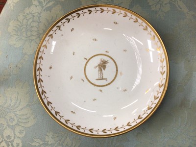 Lot 134 - A Sèvres gilt armorial dessert service, comprising four plates, four footed dishes and a pierced bowl, with printed, impressed and inscribed marks