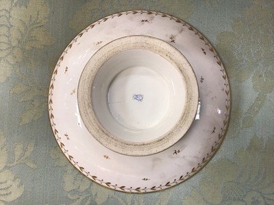 Lot 134 - A Sèvres gilt armorial dessert service, comprising four plates, four footed dishes and a pierced bowl, with printed, impressed and inscribed marks