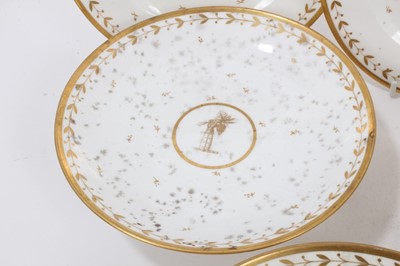 Lot 134 - A Sèvres gilt armorial dessert service, comprising four plates, four footed dishes and a pierced bowl, with printed, impressed and inscribed marks