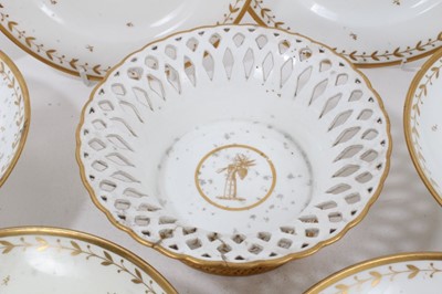Lot 134 - A Sèvres gilt armorial dessert service, comprising four plates, four footed dishes and a pierced bowl, with printed, impressed and inscribed marks