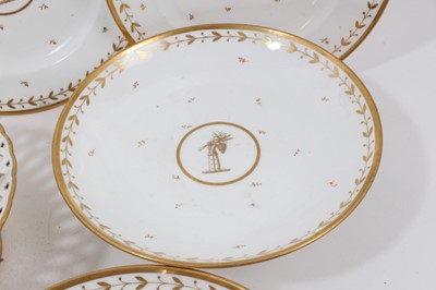 Lot 134 - A Sèvres gilt armorial dessert service, comprising four plates, four footed dishes and a pierced bowl, with printed, impressed and inscribed marks