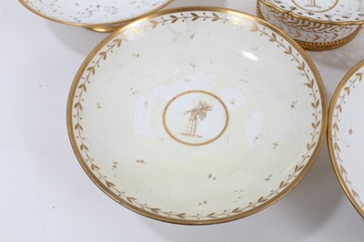 Lot 134 - A Sèvres gilt armorial dessert service, comprising four plates, four footed dishes and a pierced bowl, with printed, impressed and inscribed marks