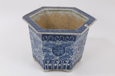 Lot 148 - A 19th century Chinese blue and white porcelain jardinière, of hexagonal form, with floral patterns, 19cm high x 28.5cm at widest point