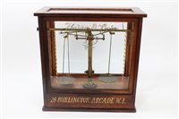 Lot 845 - Pair Edwardian shops' brass balance scales in...
