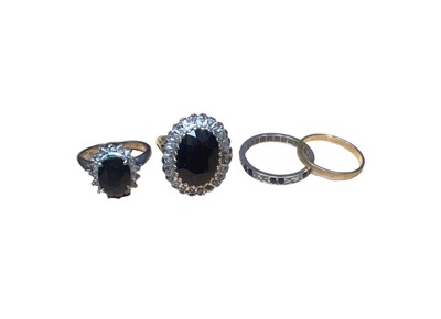 Lot 29 - Sapphire and diamond cluster ring in white gold setting, together with another sapphire and diamond cluster ring