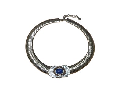 Lot 30 - Christian Dior vintage gilt metal necklace with a paste set plaque and central blue cabochon