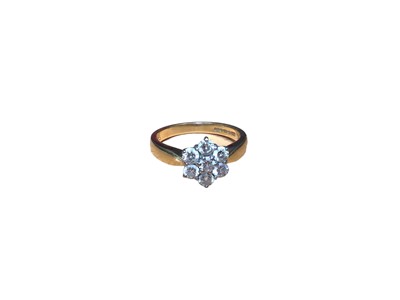 Lot 51 - 18ct gold diamond flower head cluster ring
