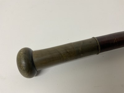 Lot 79 - Regency horn handled poison stick, the screw knop concealing a hidden compartment with a removable horn poison phial