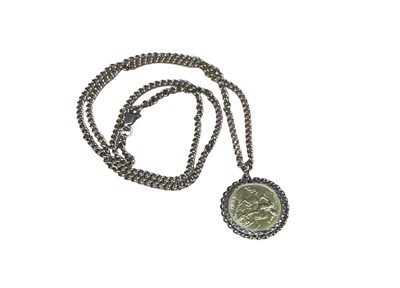 Lot 15 - Edward VII gold half sovereign, 1907, in 9ct gold pendant mount on a 9ct gold chain