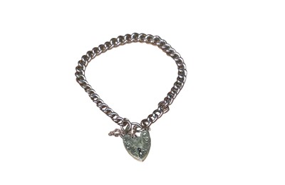 Lot 18 - 9ct gold curb link bracelet with padlock clasp