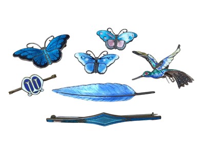 Lot 64 - Group of enamelled brooches including a David Anderson silver and enamel butterfly brooch