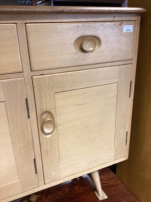 Lot 1372 - Ercol sideboard with two drawers and three cupboards below