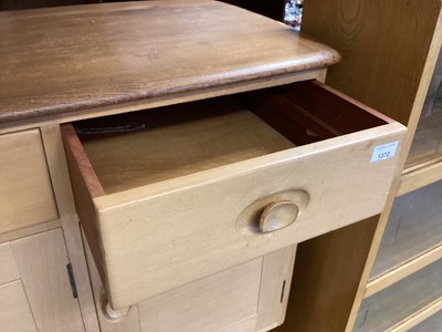 Lot 1372 - Ercol sideboard with two drawers and three cupboards below