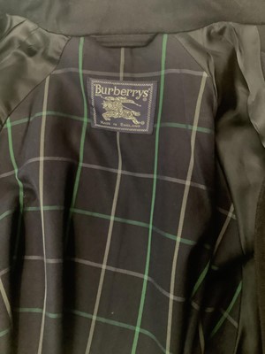 Lot 2141 - Burberrys’ women's wool jacket with tartan lining and turn back cuffs. Size 14.
