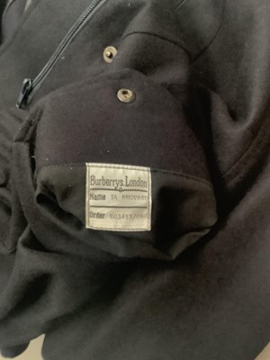 Lot 2141 - Burberrys’ women's wool jacket with tartan lining and turn back cuffs. Size 14.