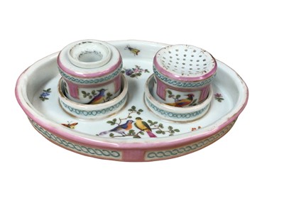 Lot 231 - Continental porcelain inkstand with well and sander