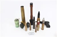 Lot 560 - Three boxes containing a selection of military...