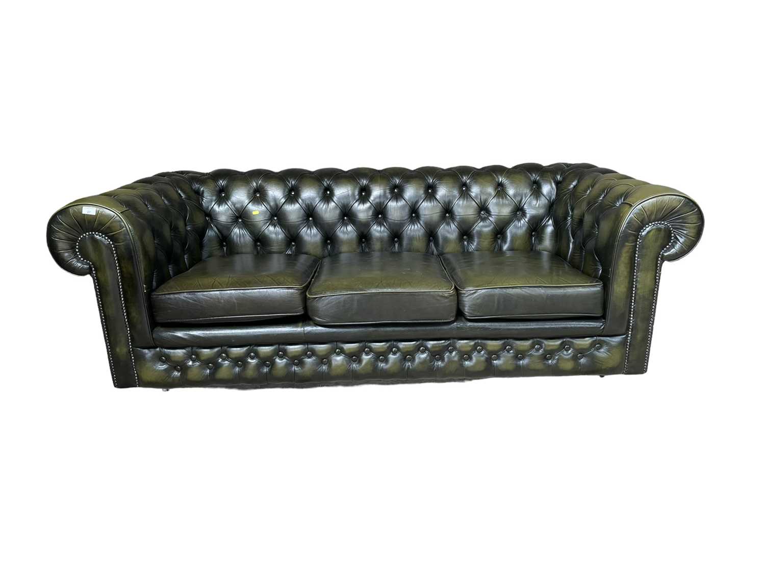 Lot 27 - Green leather three -seater chesterfield settee