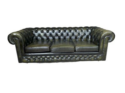 Lot 27 - Green leather three -seater chesterfield settee