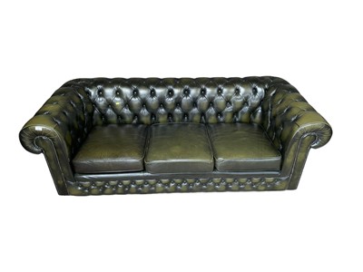 Lot 27 - Green leather three -seater chesterfield settee