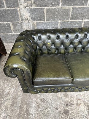 Lot 27 - Green leather three -seater chesterfield settee