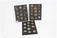 Lot 577 - Three cards mounted with forty-one British...