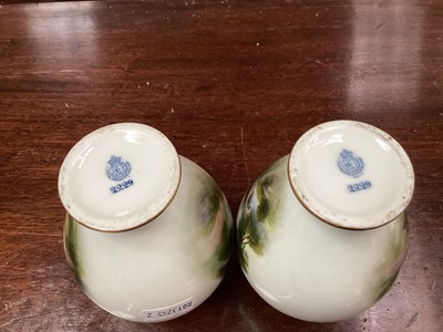 Lot 1143 - Pair of Royal Worcester vases, painted by Raymond Rushton with landscape scenes, foliate pattern to shoulder