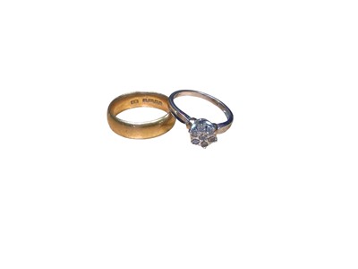 Lot 99 - 22ct gold wedding ring and a 9ct white gold diamond flower head cluster ring (2)