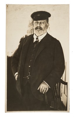 Lot 35 - H.M. King Edward VII, fine portrait photograph of the relaxed King in yacht racing attire, inscribed and with Russel & Son studio stamp to reverse 24.7 x 14.6 cm Provenance: the Russell & Son Court...