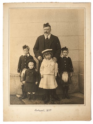 Lot 37 - H.M.King Edward VII, fine portrait photograph of The King at Balmoral 1903 with four of his grand children including the young King Edward VIII and King George VI, mounted on card 30.5 x 22.5 cm ov...