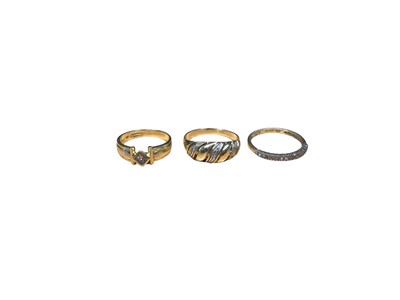 Lot 36 - 18ct gold diamond single stone ring, diamond set gold ring (stamped 585) and 9ct gold diamond set half eternity ring (3)