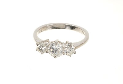 Lot 633 - Diamond three stone ring with three round brilliant cut diamonds in claw setting on 18ct white gold shank. Estimated total diamond weight approximately 2.01cts.