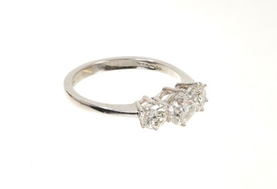 Lot 633 - Diamond three stone ring with three round brilliant cut diamonds in claw setting on 18ct white gold shank. Estimated total diamond weight approximately 2.01cts.
