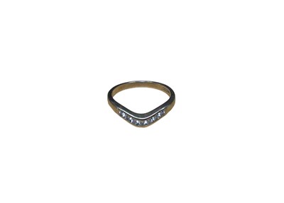 Lot 32 - 9ct gold diamond eternity ring with seven brilliant cut diamonds, weighing approximately 0.25cts in total