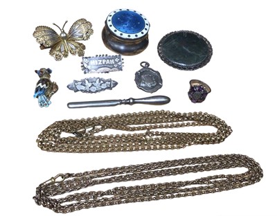 Lot 9 - Edwardian silver enamelled trinket box, two Victorian gold plated long guard chains, two silver gilt filigree brooches in the form of a butterfly and an enamelled owl,  other brooches, a silver fob...