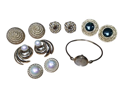 Lot 27 - Five pairs of 1980s gilt metal clip on earrings to include two pairs of Christian Dior simulated pearl earrings, two pairs by Monet and one pair by Leritz, together with a Michel Herbelin gold plat...