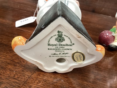 Lot 1073 - Four Royal Doulton Clowns - Balloon Clown HN2894, The Joker HN2252, The Clown HN2890 and Slapdash HN2277