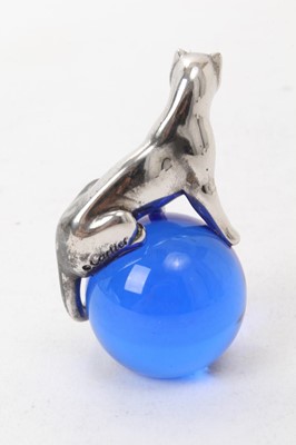 Lot 573 - Cartier silver and blue glass paperweight with Panther on a glass ball, 5.5cm