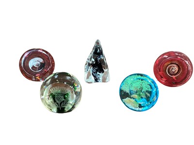 Lot 440 - Five Caithness paperweights - Vortice White, Vortice Red and Black Pyramid Twist by Helen Macdonald, Autumn Tree and Etched Thistle