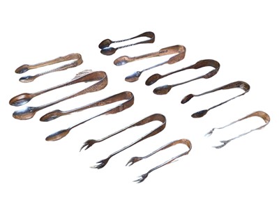 Lot 234 - Eight pairs of silver sugar tongs and two plated (10)