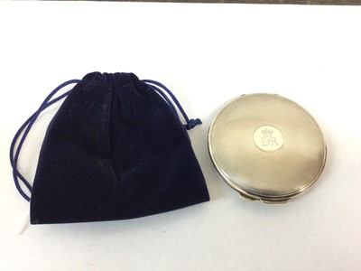 Lot 144 - H.M. Queen Elizabeth II, silver presentation circular powder compact with engraved crowned ER II cipher and engine turned decoration (Birmingham 1956) Plante. 8cm diameter with blue velvet pouch