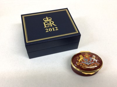 Lot 132 - H.M.Queen Elizabeth II, 2012 Royal Household Christmas present Halcyon Days oval enamel box decorated with Royal Arms and 2012, inscribed inside the lid ' The Diamond Jubilee Presented by Her Majes...
