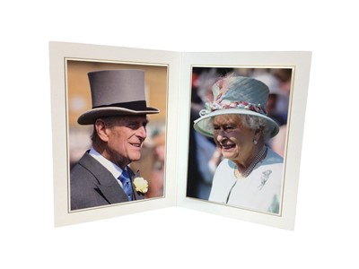 Lot 141 - H.M.Queen Elizabeth II and H.R.H. The Duke of Edinburgh, signed 2013 Christmas card with colour portrait photographs of the Royal couple