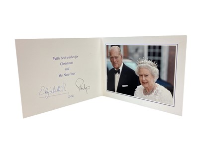 Lot 154 - H.M.Queen Elizabeth II and H.R.H. The Duke of Edinburgh, signed 2011 Christmas card with twin gilt ciphers to cover, colour photograph of the Royal couple to the interior with envelope